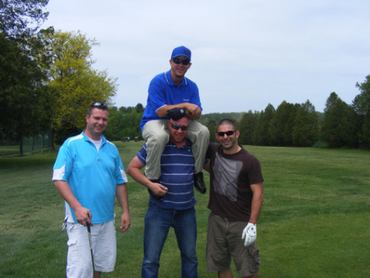 It wasn't all serious golf for Richard Schafer (Walkerton), perched on the shoulders of Mike Vandenberg (Walkerton) and flanked by team-mates Terri Evans (Hanover) and Jason Whitehead (Walkerton). The lads golfed well, with eight birdies and a single bogey to finish at 65 (-7), good for third spot in the Back for the Future tournament.